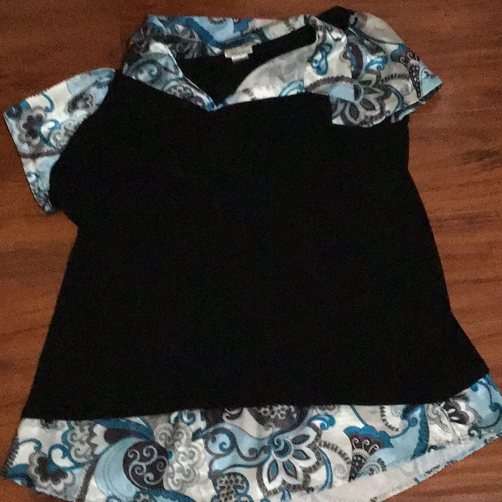 A 90s plus size women’s shirt/blouse.